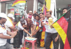 আলমডাঙ্গায় জার্মান ফুটবল সমর্থকদের কেক কেটে-রঙিন ধোয়া উড়িয়ে পতাকা উত্তোলন